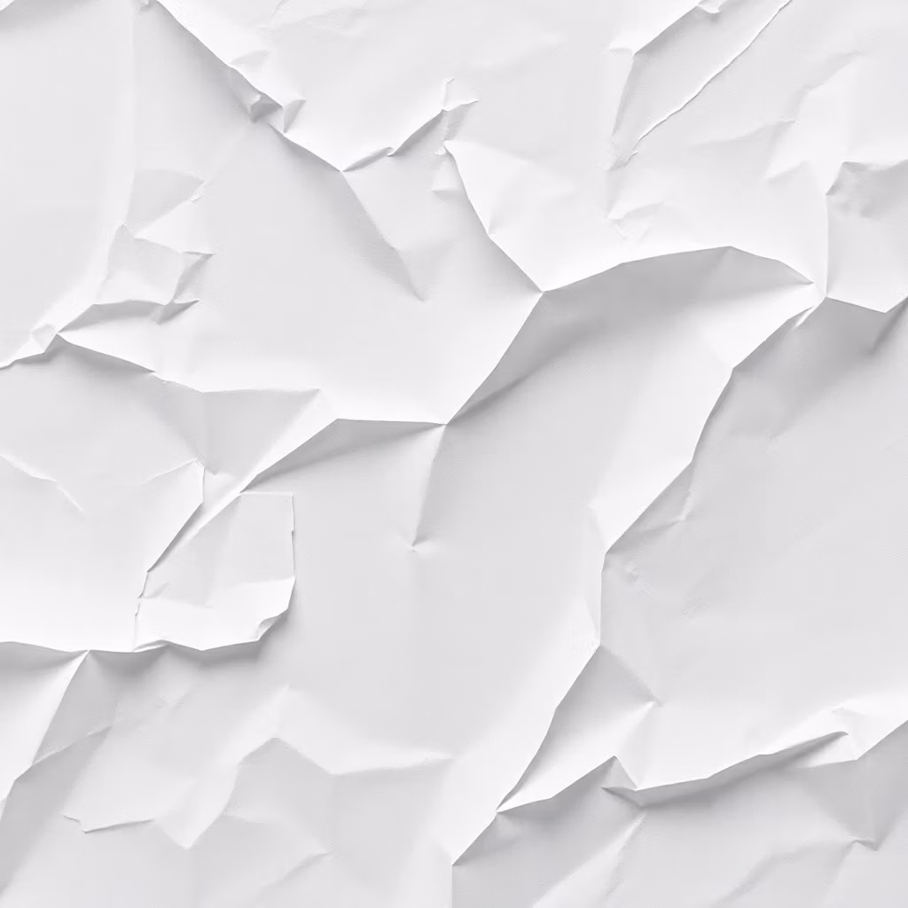 Silkespapper.se erbjuder vitt silkespapper med flera veck och veckningar, vilket resulterar i en ojämn, texturerad yta med tydliga skuggor och ljusa partier.